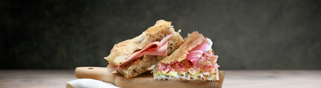 Pizza con mortadella e pizza con prosciutto e fichi