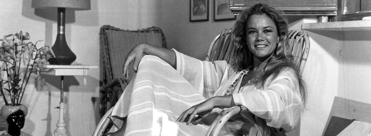 valeria moriconi sorridente su una sedia a dondolo